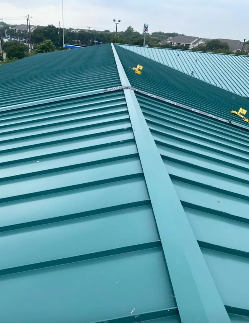 Green commercial metal roof ridge and valley for Metal Roof Repair in Willow Park